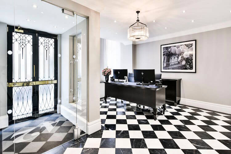 Stunning, professional serviced office reception at 42 Brook Street, Mayfair to greet office clients.